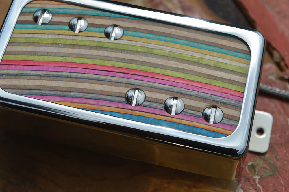 McNelly started working with Prisma Guitars in 2014. They're known for making guitars from recycled skateboards. It wasn't long before they got talking about how to incorporate the skateboards into the pickups themselves. Several months later, they had them worked out and looking amazing.

** These are unique products and the colour will vary **